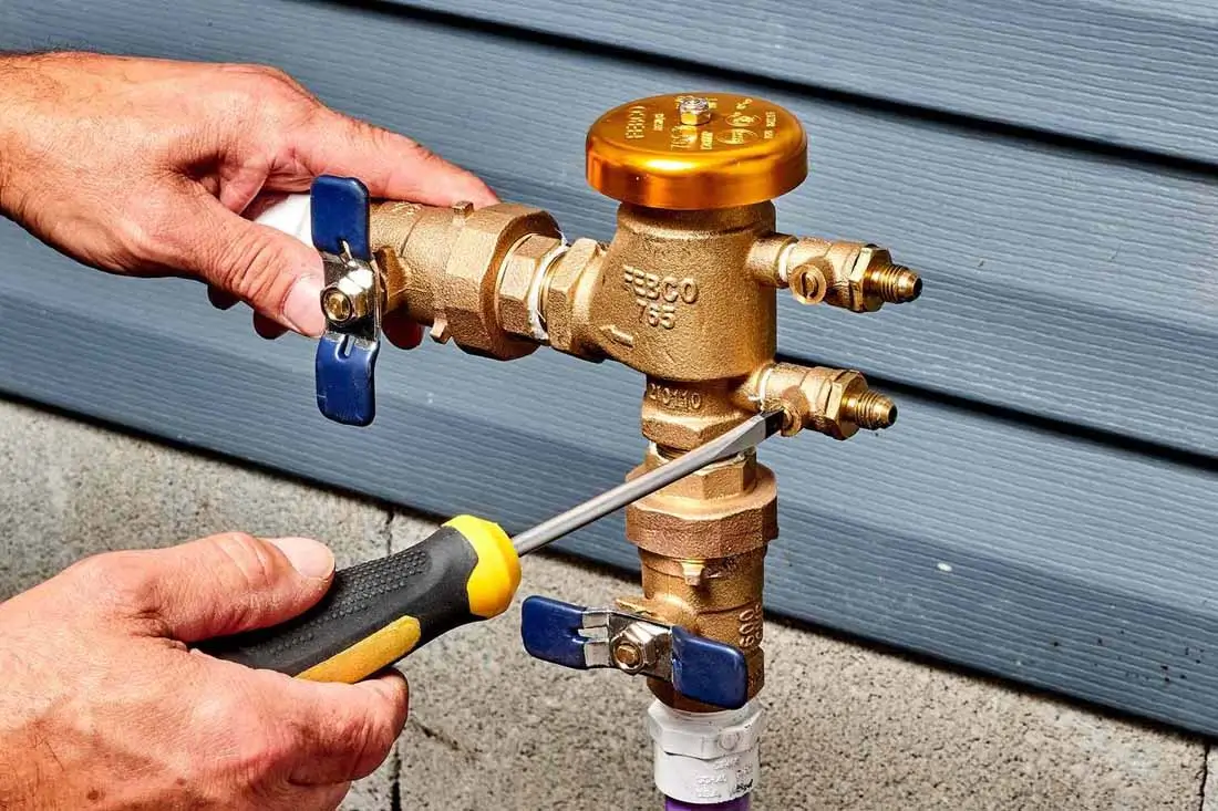 Backflow preventer repair for residential sprinkler system