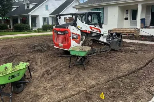 Clean Cut Landscape Co. Corrects Yard Grading for Metairie Homeowners